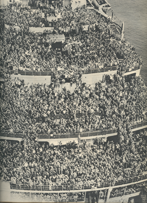 Passengers on board the Queen Elizabeth—a contingent of 14,000 American soldiers beginning their journey home following the defeat of Hitler.