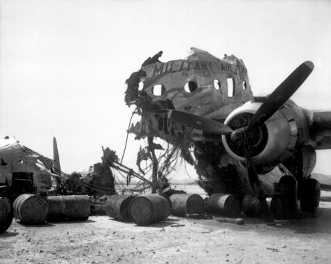 Wreckage of a C-54 destroyed on the ground at Kimpo Airfield by North Koreans on 25 June 1950. Photographed on September 18 1950.