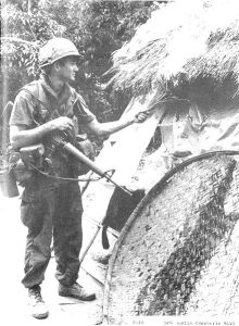 SP4 Dustin setting fire to dwelling (during the My Lai massacre)