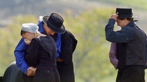 A-community-drawn-together-in-mourningMembers of the Nickel Mines Amish community came together to share their sorrow the day after the shooting.